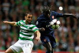GLASGOW, SCOTLAND - AUGUST 18:  Shaun Maloney of Celtic goes up for the ball against Bacary Sagna of Arsenal during a UEFA Champions League Qualifying match between Celtic and Arsenal at Celtic Park on August 18, 2009 in Glasgow, Scotland.  (Photo by Phil Cole/Getty Images)