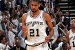 SAN ANTONIO - APRIL 20:  Forward Tim Duncan #21 of the San Antonio Spurs reacts against the Dallas Mavericks in Game Two of the Western Conference Quarterfinals during the 2009 NBA Playoffs at AT&T Center on April 20, 2009 in San Antonio, Texas. NOTE TO USER: User expressly acknowledges and agrees that, by downloading and or using this photograph, User is consenting to the terms and conditions of the Getty Images License Agreement.  (Photo by Ronald Martinez/Getty Images)