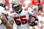 TAMPA, FL - SEPTEMBER 28: Linebacker Derrick Brooks #55 of the Tampa Bay Buccaneers celebrates an interception against the Green Bay Packers at Raymond James Stadium on September 28, 2008 in Tampa, Florida.  (Photo by Al Messerschmidt/Getty Images) 