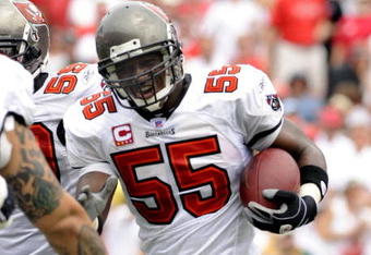 TAMPA, FL - SEPTEMBER 28: Linebacker Derrick Brooks #55 of the Tampa Bay Buccaneers celebrates an interception against the Green Bay Packers at Raymond James Stadium on September 28, 2008 in Tampa, Florida.  (Photo by Al Messerschmidt/Getty Images) 