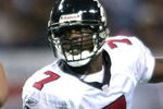 6 Jan 2002: Quarterback Michael Vick #7 of the Atlanta Falcons scrambles against the St. Louis Rams at the Dome at America's Center in St. Louis, Missouri. DIGITAL IMAGE. Mandatory Credit: Elsa /Getty Images