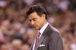 INDIANAPOLIS - MARCH 29:  Head coach Rick Pitino of the Louisville Cardinals walks with his head down against the Michigan State Spartans during the fourth round of the NCAA Division I Men's Basketball Tournament at the Lucas Oil Stadium on March 29, 2009 in Indianapolis, Indiana.  (Photo by Andy Lyons/Getty Images)
