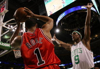 BOSTON - MAY 02:  Rajon Rondo #9 of the Boston Celtics tries to keep Derrick Rose #1 of the Chicago Bulls from passing the ball in bounds in Game Seven of the Eastern Conference Quarterfinals during the 2009 NBA Playoffs at TD Banknorth Garden on May 2, 2009 in Boston, Massachusetts. The Celtics defeated the Bulls 109-99. NOTE TO USER: User expressly acknowledges and agrees that, by downloading and or using this photograph, User is consenting to the terms and conditions of the Getty Images License Agreement.  (Photo by Elsa/Getty Images)