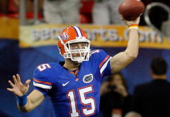 ATLANTA - DECEMBER 06: Quarterback Tim Tebow #15 of the Florida Gators throws a pass against the Alabama Crimson Tide during the SEC Championship on December 6, 2008 at the Georgia Dome in Atlanta, Georgia. The Gators defeated the Crimson Tide 31-20.  (Photo by Chris Graythen/Getty Images)
