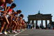 BERLIN - AUGUST 23:  Athletes start next to the Brandenburg Gate as they compete in the women's Marathon Final during day nine of the 12th IAAF World Athletics Championships on August 23, 2009 in Berlin, Germany.  (Photo by Stu Forster/Getty Images)