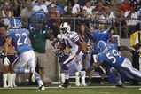 CANTON, OH - AUGUST 9: Roscoe Parrish #11 of the Buffalo Bills looks for running room after catching a pass against the Tennessee Titans during the Pro Football Hall of Fame Game at Fawcett Stadium on August 9, 2009 in Canton, Ohio. The Titans defeated the Bills 21-18. (Photo by Joe Robbins/Getty Images)