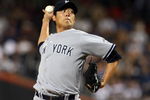 NEW YORK - JUNE 28: Chien-Ming Wang #40 of the New York Yankees pitches against the New York Mets on June 28, 2009 at Citi Field in the Flushing neighborhood of the Queens borough of New York City. (Photo by Jim McIsaac/Getty Images)