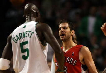 BOSTON - NOVEMBER 10:  Jose Calderon #8 of the Toronto Raptors and Kevin Garnett #5 of the Boston Celtics exchange words on November 10,  2008 at TD Banknorth Garden in Boston, Massachusetts. The Celtics defeated the Toronto Raptors 94-87.  NOTE TO USER: User expressly acknowledges and agrees that, by downloading and/or using this Photograph, user is consenting to the terms and conditions of the Getty Images License Agreement.  (Photo by Elsa/Getty Images)