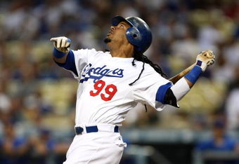 LOS ANGELES - AUGUST 21: Manny Ramirez #99 of the Los Angeles Dodgers flies out in the first inning against the Chicago Cubs on August 21, 2009 at Dodger Stadium in Los Angeles, California.    (Photo by Stephen Dunn/Getty Images)