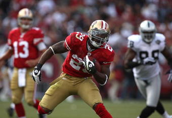 SAN FRANCISCO - AUGUST 22: Glen Coffee #29 of the San Francisco 49ers runs against the Oakland Raiders during a preseason game on August 22, 2009 at Candlestick Park in San Francisco, California.  (Photo by Jed Jacobsohn/Getty Images)