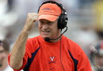 ATLANTA - NOVEMBER 20:  Head coach Al Groh shows his excitement after Alvin Pearman of the Virginia Cavaliers went 36 yards for a first down against the Georgia Tech Yellow Jackets as the Cavs defeated the Yellow Jackets 30-10 during NCAA football action at Bobby Dodd Stadium on November 20, 2004 in Atlanta, Georgia. (Photo by Doug Pensinger/Getty Images)