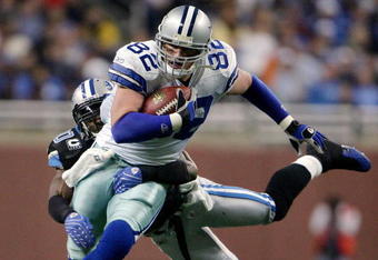 DETROIT - DECEMBER 09:  Jason Witten #82 of the Dallas Cowboys is tackled by Ernie Sims #50 of the Detroit Lions on December 9, 2007 at Ford Field in Detroit, Michigan.  (Photo by Chris McGrath/Getty Images)