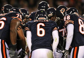 CHICAGO - AUGUST 22: Jay Cutler #6 of the Chicago Bear calls a play in the huddle during a pre-season game against the New York Giants on August 22, 2009 at Soldier Field in Chicago, Illinois. The Bears defeated the Giants 17-3. (Photo by Jonathan Daniel/Getty Images)