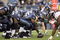 SEATTLE - AUGUST 22:  Center Chris Spencer #65 of the Seattle Seahawks gets ready to hike the ball during the game against the Denver Broncos on August 22, 2009 at Qwest Field in Seattle, Washington. (Photo by Otto Greule Jr/Getty Images)  