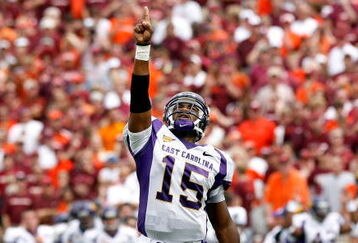 BLACKSBURG, VA - SEPTEMBER 01:  Quarterback Patrick Pinkney #15 of the East Carolina Pirates reacts after the Pirates scored a touchdown against the Virginia Tech Hokies on September 1, 2007 at Lane Stadium in Blacksburg, Virginia.  (Photo by Kevin C. Cox/Getty Images)