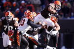 CLEVELAND - DECEMBER 21: Jamal Lewis #31 of the Cleveland Browns jumps over Chinedum Ndukwe #41 of the Cincinnati Bengals for a first quarter first down at Cleveland Browns Stadium December 21, 2008 in Cleveland, Ohio.  (Photo by Gregory Shamus/Getty Images)