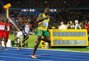 BERLIN - AUGUST 16:  Usain Bolt of Jamaica crosses the line to win the gold medal in the men's 100 Metres Final during day two of the 12th IAAF World Athletics Championships at the Olympic Stadium on August 16, 2009 in Berlin, Germany. Bolt set a new World Record of 9.58.  (Photo by Andy Lyons/Getty Images)