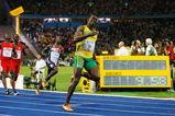 BERLIN - AUGUST 16:  Usain Bolt of Jamaica crosses the line to win the gold medal in the men's 100 Metres Final during day two of the 12th IAAF World Athletics Championships at the Olympic Stadium on August 16, 2009 in Berlin, Germany. Bolt set a new World Record of 9.58.  (Photo by Andy Lyons/Getty Images)