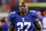 EAST RUTHERFORD, NJ - AUGUST 17:  Brandon Jacobs #27 of the New York Giants runs off the field after defeating the Carolina Panthers on August 17, 2009 at Giants Stadium in East Rutherford, New Jersey. The Giants defeated the Panthers 24-17.  (Photo by Jim McIsaac/Getty Images)