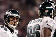 FOXBORO, MA - NOVEMBER 25:  Greg Lewis #83 of the Philadelphia Eagles celebrates his touchdown catch with Reggie Brown #86 and Kevin Curtis #80 in the second quarter against the New England Patriots at Gillette Stadium on November 25, 2007 in Foxboro, Massachusetts.  (Photo by Michael Heiman/Getty Images)