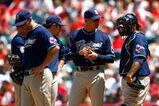 ANAHEIM, CA - JUNE 14:  (L-R) Kevin Kouzmanoff #5, Adrian Gonzalez #23, manager Bud Black and Henry Blanco #28 of the San Diego Padres wait for pitcher Greg Burke (not pictured) to enter the game in the fifth inning against the Los Angeles Angels of Anaheim at Angel Stadium on June 14, 2009 in Anaheim, California. The Angels defeated the Padres 6-0.  (Photo by Jeff Gross/Getty Images)