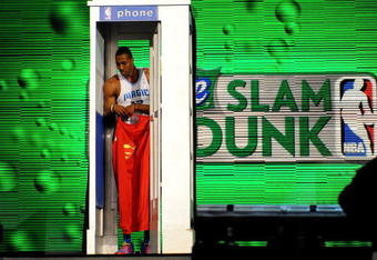 PHOENIX - FEBRUARY 14:  Dwight Howard of the Orlando Magic emerges from a phone booth wearing a Superman cape during the Sprite Slam Dunk Contest on All-Star Saturday Night, part of 2009 NBA All-Star Weekend at US Airways Center on February 14, 2009 in Phoenix, Arizona.  NOTE TO USER: User expressly acknowledges and agrees that, by downloading and or using this photograph, User is consenting to the terms and conditions of the Getty Images License Agreement.  (Photo by Ronald Martinez/Getty Images)