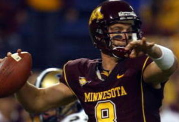 MINNEAPOLIS - SEPTEMBER 13:  Quarterback Adam Weber #8 of the Minnesota Golden Gophers drops back to pass against the Montana State Bobcats at the Metrodome on September 13, 2008 in Minneapolis, Minnesota.  (Photo by Jeff Gross/Getty Images)