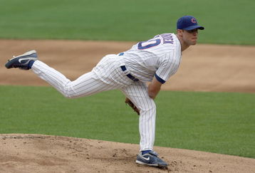 CHICAGO - JULY 26: Rich Harden #40 of the Chicago Cubs delivers the pitch during the game against the Cincinnati Reds on July 26, 2009 at Wrigley Field in Chicago, Illinois. (Photo by Jonathan Daniel/Getty Images) 