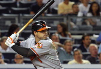 NEW YORK - JULY 20:  Brian Roberts #1 of the Baltimore Orioles bats against the New York Yankees on July 20, 2009 at Yankee Stadium in the Bronx borough of New York City.  (Photo by Jim McIsaac/Getty Images)
