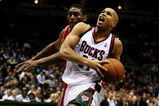 MILWAUKEE - FEBRUARY 09: Richard Jefferson #24 of the Milwaukee Bucks drives to the basket past Ron Artest #96 of the Houston Rockets on February 9, 2009 at the Bradley Center in Milwaukee, Wisconsin. The Bucks defeated the Rockets 124-112. NOTE TO USER: User expressly acknowledges and agreees that, by downloading and/or using this Photograph, User is consenting to the terms and conditions of the Getty Images License Agreement. (Photo by Jonathan Daniel/Getty Images)