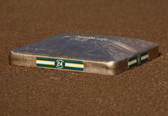 OAKLAND, CA - AUGUST 01:  A golden base with Hall of Fame baseball player Rickey Henderson's number 24 is seen on the field before the start of a ceremony to retire his number 24 by the Oakland Athletics before the start of the game against the Toronto Blue Jays August 1, 2009 at the McAfee Coliseum in Oakland, California. Henderson was inducted into the Baseball Hall of Fame July 26.  (Photo by Justin Sullivan/Getty Images)