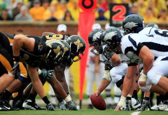 COLUMBIA, MO - SEPTEMBER 13:  The Nevada Wolf Pack offense faces off against the Missouri Tigers defense during the first half of the game on September 13, 2008 at Memorial Stadium in Columbia, Missouri.  (Photo by Jamie Squire/Getty Images)