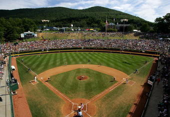 SOUTH WILLIAMSPORT, PA - AUGUST 26: Keaton Allen #11 of the Southeast team from Warner Robins, Georgia throws to first pitch of the game against Kanta Hiraide #2 of the Japanese team from Tokyo, Japan during the Little League World Series Championship game on August 26, 2007 at Lamade Stadium in South Williamsport, Pennsylvania.  (Photo by Jim McIsaac/Getty Images)
