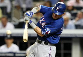 NEW YORK - AUGUST 25:  Josh Hamilton #32 of the Texas Rangers hits a 2-run signal in the top of the fourth inning against the New York Yankees on August 25, 2009 at Yankee Stadium in the Bronx borough of New York City. (Photo By Al Bello/Getty Images)