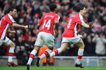 LONDON - NOVEMBER 08:  Samir Nasri of Arsenal (R) celebrates with Theo Walcott and Francesc Fabregas as he scores their second goal during the Barclays Premier League match between Arsenal and Manchester United at the Emirates Stadium on November 8, 2008 in London, England.  (Photo by Shaun Botterill/Getty Images)