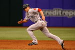 ST. PETERSBURG, FL - MAY 3: Outfielder Jacoby Ellsbury #46 of the Boston Red Sox attempts a steal against the Tampa Bay Rays May 3, 2009 at Tropicana Field in St. Petersburg, Florida. (Photo by Al Messerschmidt/Getty Images)