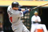 OAKLAND, CA - JUNE 11:  Joe Crede #24 of the Minnesota Twins bats against the Oakland Athletics during a Major League Baseball game on June 11, 2009 at the Oakland Coliseum in Oakland, California.  (Photo by Jed Jacobsohn/Getty Images)