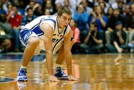 DURHAM, NC - NOVEMBER 27:  Greg Paulus #3 of the Duke Blue Devils slaps the floor on defense against the Wisconsin Badgers during the second half at Cameron Indoor Stadium on November 27, 2007 in Durham, North Carolina.  Duke defeated Wisconsin 82-58.  (Photo by Kevin C. Cox/Getty Images)