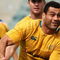 PERTH, AUSTRALIA - AUGUST 28:  George Smith of the Wallabies passes the ball during the Australian Wallabies captain's run at Subiaco Oval on August 28, 2009 in Perth, Australia.  (Photo by Quinn Rooney/Getty Images)