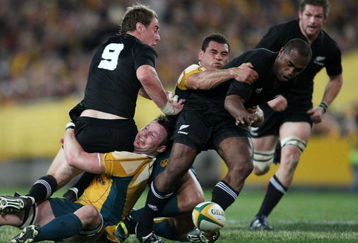 SYDNEY, AUSTRALIA - AUGUST 22:  Sitiveni Sivivatu of the All Blacks is tackled by George Smith of the Wallabies during the 2009 Tri Nations series Bledisloe Cup match between the Australian Wallabies and the New Zealand All Blacks at ANZ Stadium on August 22, 2009 in Sydney, Australia.  (Photo by Mark Nolan/Getty Images)