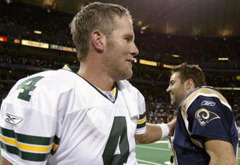 ST. LOUIS - OCTOBER 19:  Brett Favre #4 of the Green Bay Packers and Kurt Warner #13 of the St. Louis Rams greet each other after the game October 19, 2003 at the Edward Jones Dome in St. Louis, Missouri. The St. Louis Rams beat the Green Bay Packers 34-24.  (Photo by Elsa/Getty Images)