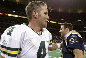 ST. LOUIS - OCTOBER 19:  Brett Favre #4 of the Green Bay Packers and Kurt Warner #13 of the St. Louis Rams greet each other after the game October 19, 2003 at the Edward Jones Dome in St. Louis, Missouri. The St. Louis Rams beat the Green Bay Packers 34-24.  (Photo by Elsa/Getty Images)