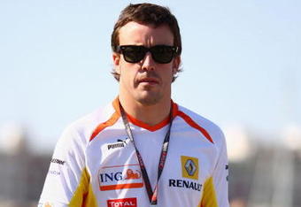 VALENCIA, SPAIN - AUGUST 22:  Fernando Alonso of Spain and Renault walks in the paddock following qualifying for the European Formula One Grand Prix at the Valencia Street Circuit on August 22, 2009, in Valencia, Spain.  (Photo by Ryan Pierse/Getty Images)