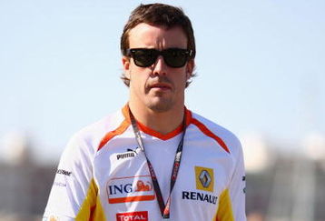 VALENCIA, SPAIN - AUGUST 22:  Fernando Alonso of Spain and Renault walks in the paddock following qualifying for the European Formula One Grand Prix at the Valencia Street Circuit on August 22, 2009, in Valencia, Spain.  (Photo by Ryan Pierse/Getty Images)