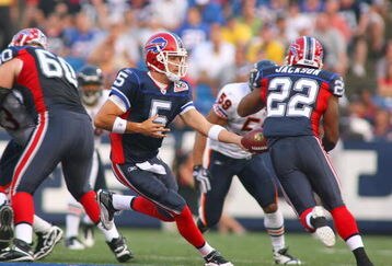 ORCHARD PARK, NY - AUGUST 15:  Trent Edwards #5  of the Buffalo Bills hands off to Fred Jackson #22 against the Chicago Bears on August 15, 2009 at Ralph Wilson Stadium in Orchard Park, New York.  (Photo by Rick Stewart/Getty Images)