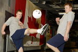 23 APR 2002: Twin brothers Henrik (Left) and Daniel Sedin of the Vancouver Canucks kick a soccer ball as they warm up before game four of the NHL Western Conference Quarterfinals against the Detroit Red Wings at General Motors Place in Vancouver, Canada.  DIGITAL IMAGE  Mandatory Credit:  Jeff Vinnick/Getty Images/NHLI