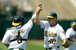 OAKLAND, CA - JUNE 07:  Kurt Suzuki #8 of the Oakland Athletics congratulates relief pitcher Andrew Bailey #40 after the Athletics beat the Baltimore Orioles at the Oakland Coliseum on June 7, 2009 in Oakland, California.  (Photo by Ezra Shaw/Getty Images)