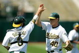 OAKLAND, CA - JUNE 07:  Kurt Suzuki #8 of the Oakland Athletics congratulates relief pitcher Andrew Bailey #40 after the Athletics beat the Baltimore Orioles at the Oakland Coliseum on June 7, 2009 in Oakland, California.  (Photo by Ezra Shaw/Getty Images)