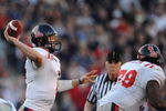 DALLAS - JANUARY 02:  Quarterback Jevan Snead #4 of the Mississippi Rebels drops back to pass against the Texas Tech Red Raiders during the AT&T Cotton Bowl on January 2, 2009 at the Cotton Bowl in Dallas, Texas.  (Photo by Ronald Martinez/Getty Images)