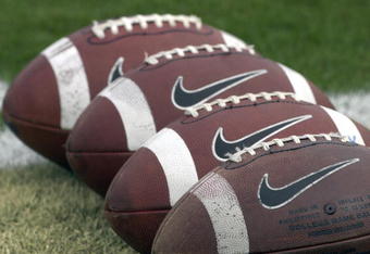 ORLANDO, FL - OCTOBER 20: Nike footballs line up for warmups as the University of Central Florida Golden Knights host the Tulsa Golden Hurricane at Bright House Stadium on October 20, 2007 in Orlando, Florida.  UCF won 44 - 23. (Photo by Al Messerschmidt/Getty Images)
